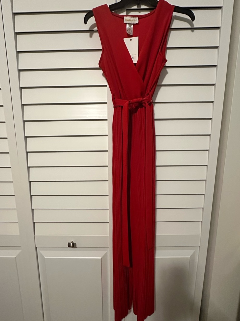 Bold & Chic Red Sleeveless Wrap Jumpsuit with Tie Waist